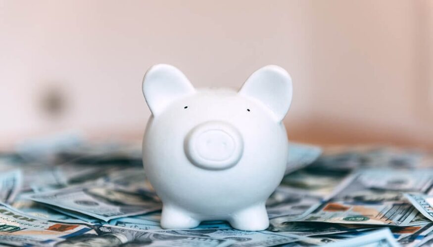 Piggy moneybox with dollar cash closeup