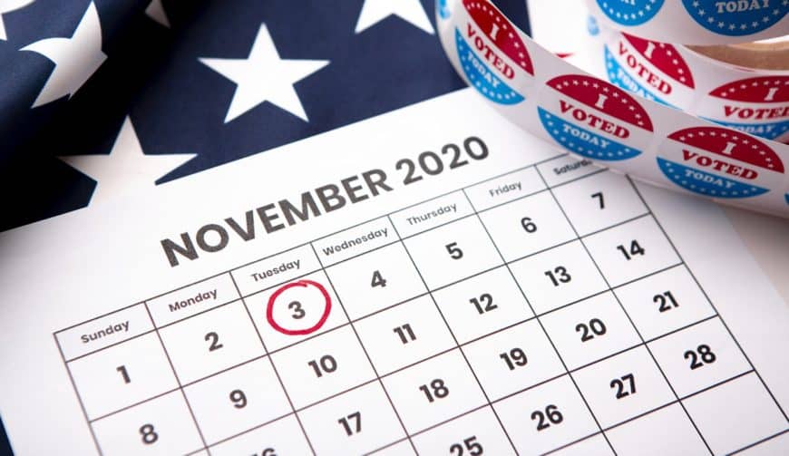 November 2020 presidential election date on calendar concept. Red white and blue colors and the american flag.